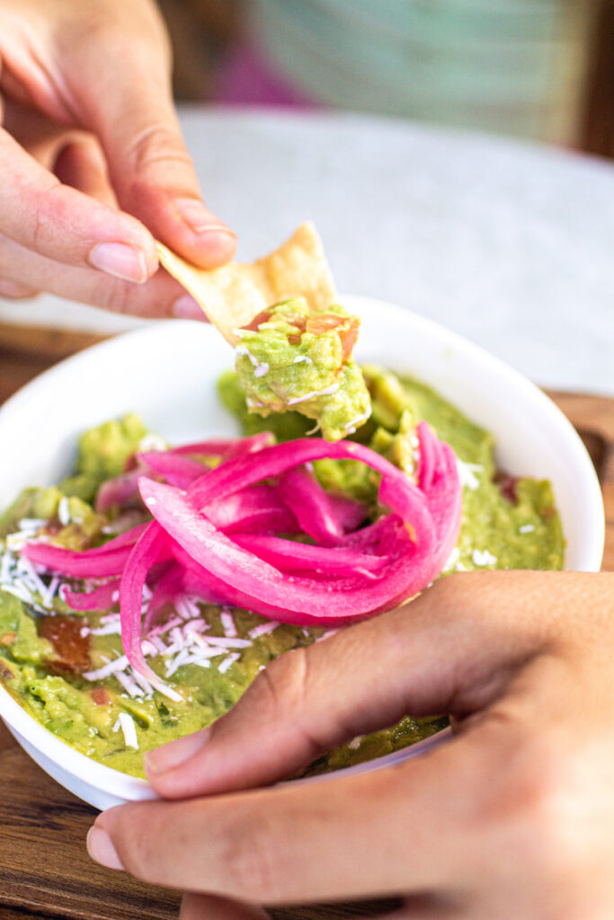 Taking a cooking class is one of the best things to do in Cabo in August when it rains